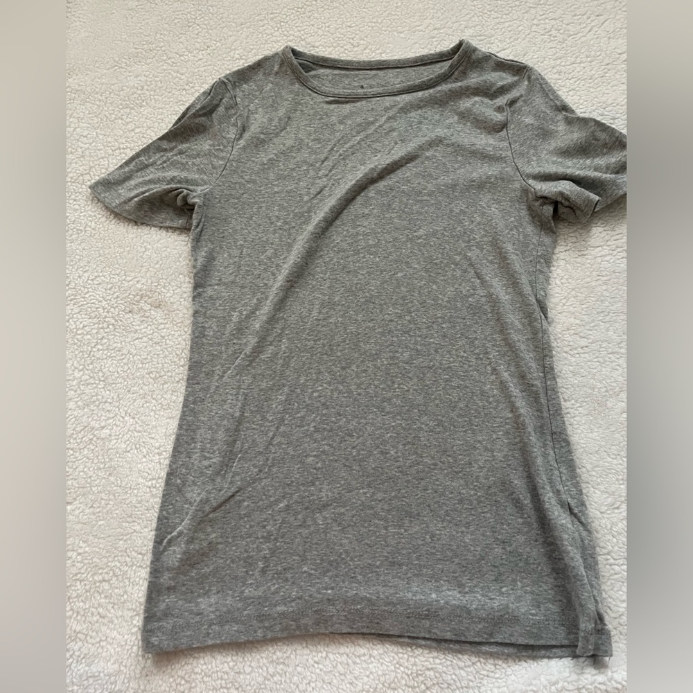 The brand is Target A New Day. It’s a gray color. Very soft. An extra small.